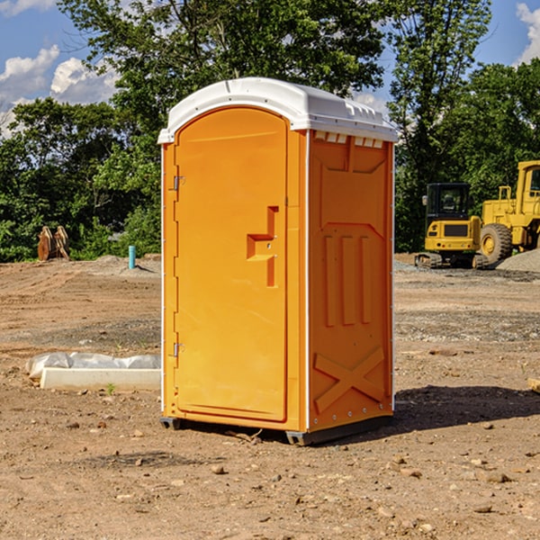 what is the cost difference between standard and deluxe portable toilet rentals in Winnebago